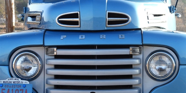 Old light blue truck at Automotion car show