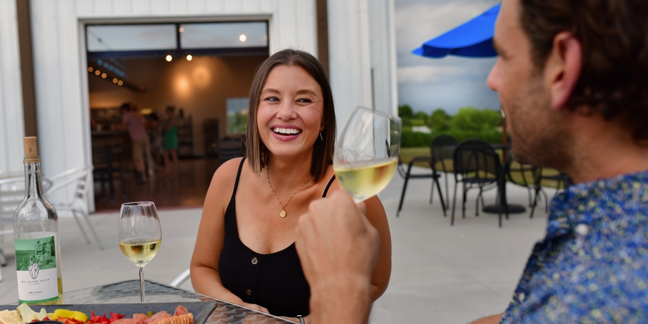 A couple at Balanced Rock Winery.