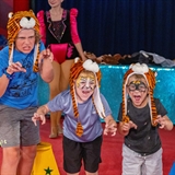 Kids dressed as tigers.