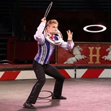 Circus artist doing tricks.