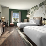 Hotel room with queen beds at Dellshire Resort