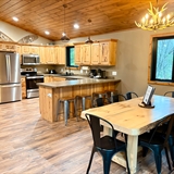 A cozy kitchen with wooden details.