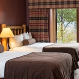 Two bed bedroom with outdoor patio.