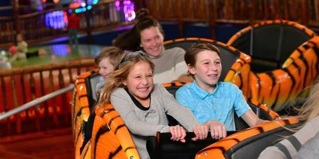 Kids on Knuckleheads tiger roller coaster