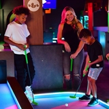 People mini golfing