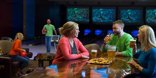 People having food and drinks at the Knuckleheads bar