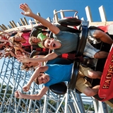 People on a roller coaster.