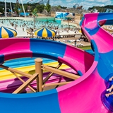 People enjoying the outdoor waterpark at Mt. Olympus Resort.