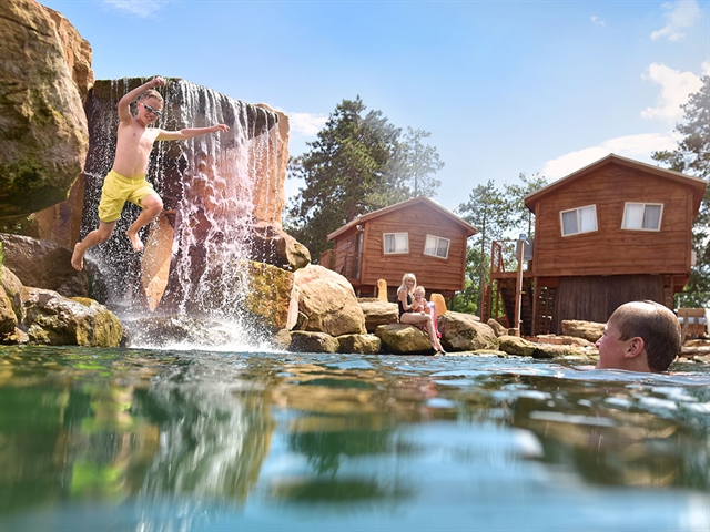 Large yellow waterslide at Yogi Bear Campground.