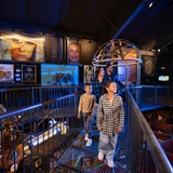Family looking at art at Ripley's Believe It or Not! Museum