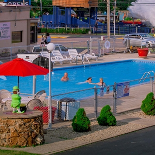 Shamrock Motel with outdoor pool.