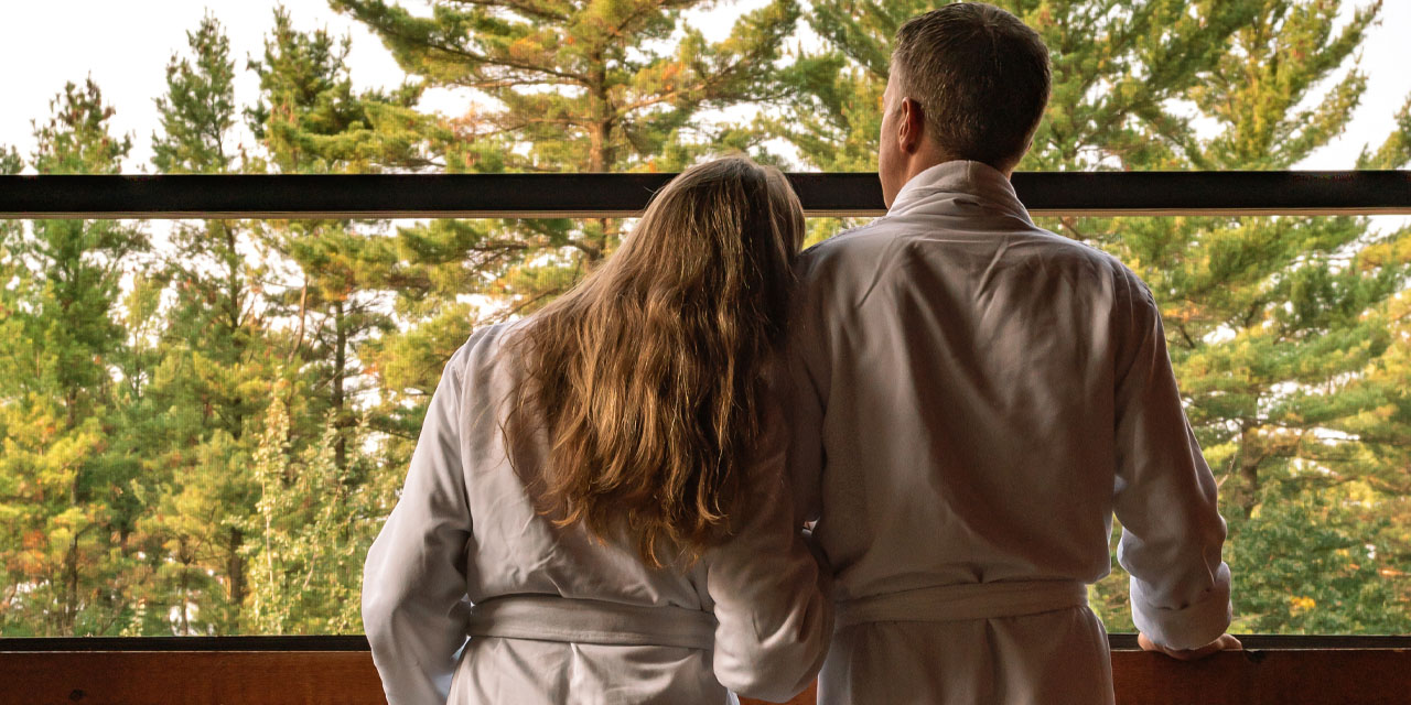 A couple in robes at Sundara Inn & Spa