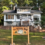 Beautiful white bed and breakfast house.