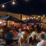 People enjoy the outdoor patio space.