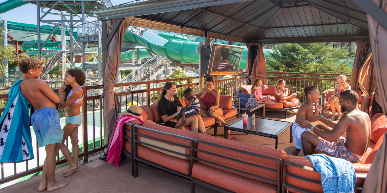 Family in a cabana at Wilderness Resort Waterpark
